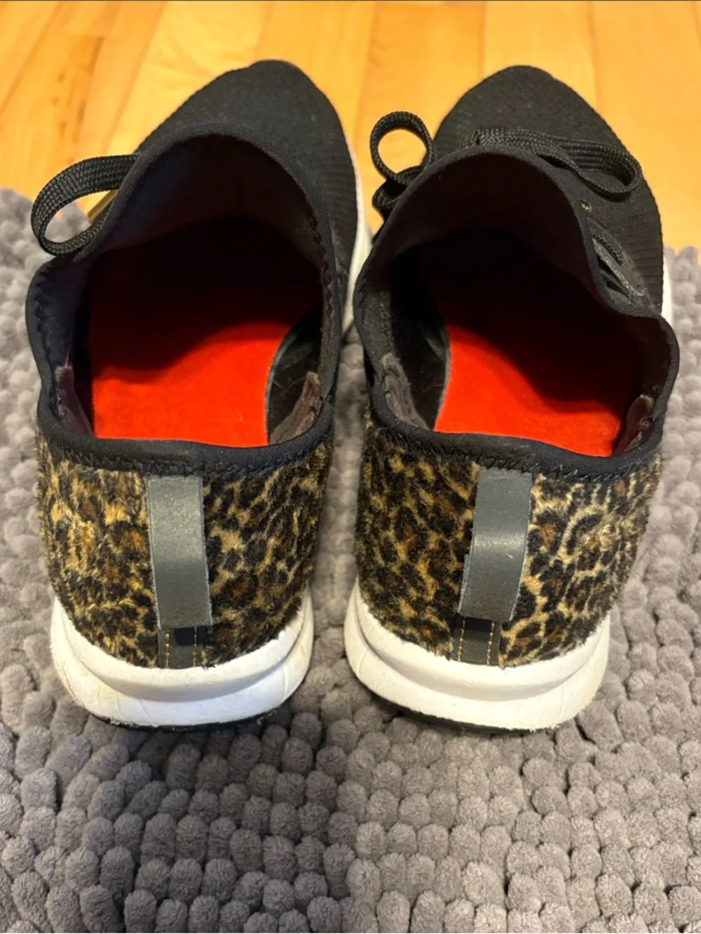New Balance Black Knit Slip-On Sneakers with Leopard Heel Accent